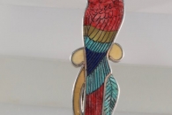 Parrot pin/pendant by Harlan Coonsis