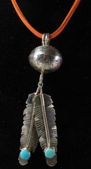 Squash Blossom + feathers pendant by Tawney Willie and Allen Cruz